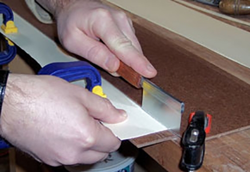 Cutting strips of veneer off large panel