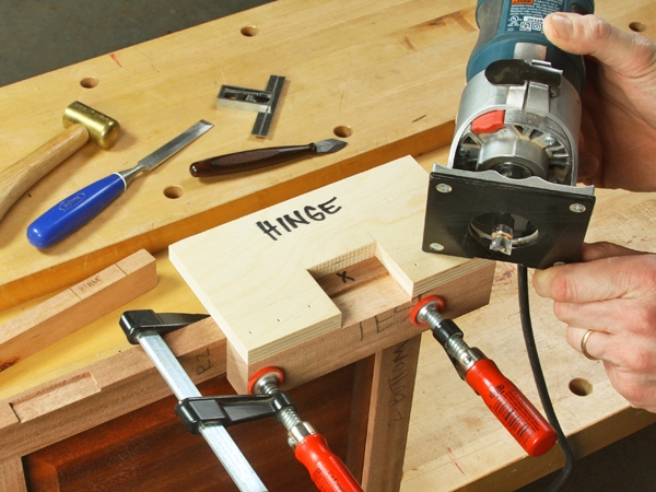 Routing a hinge location with a compact router
