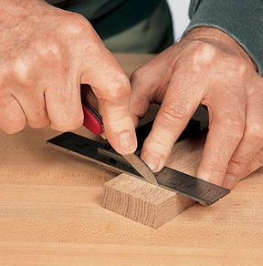 Marking joinery layout lines using a marking knife