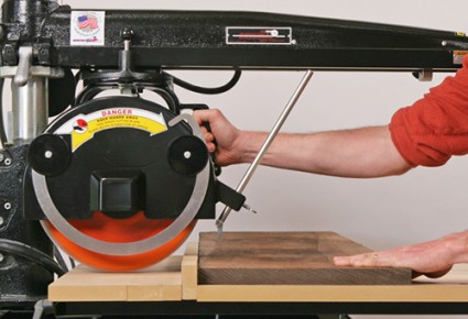 Making cut with a radial arm saw
