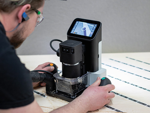 Using a Shaper origin router and tape to make a cut