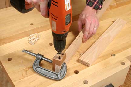 Using shop-made doweling jig to install dowel joints