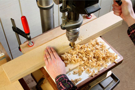 Drilling hole in router fence with Forstner bit