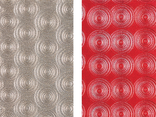 Silver and red variations of an engine turned finish