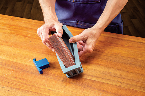 Removing resin handle block from mold