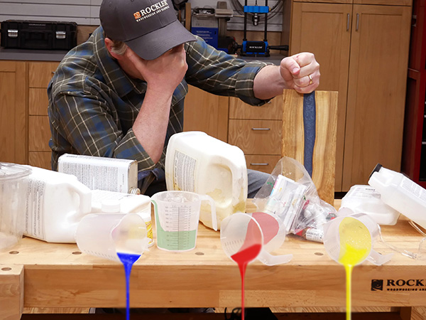 man with epoxy mess in workshop