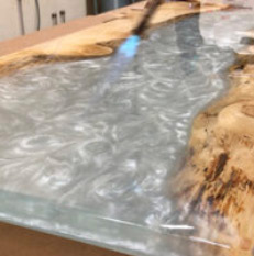 Using a torch to remove bubbles from epoxy