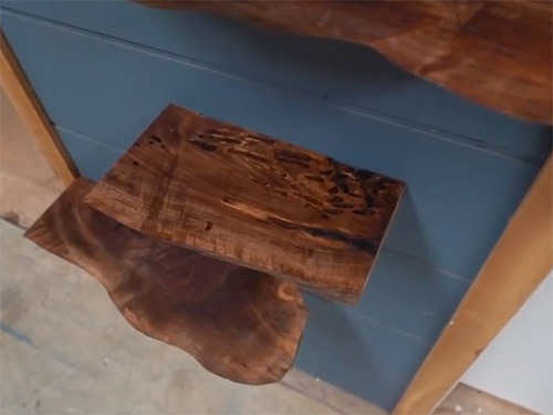 Floating live edge walnut shelving with unique features