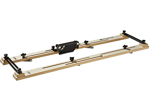 Fully assembled cove cutting jig for a table saw