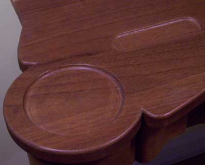 Routed recess in a game table for storing cards and poker chips