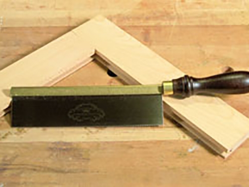 Frame corner cut entirely with a gent's saw