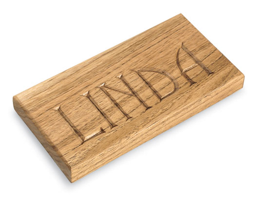 Sign with hand carved lettering
