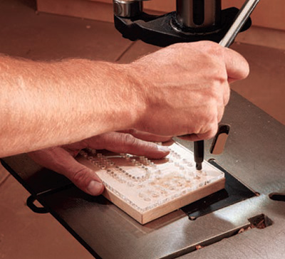 using hole drilling jig to drill cribbage board holes