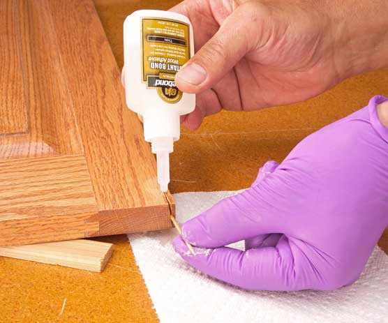 Adding cyanoacrylate glue to close crack in wood