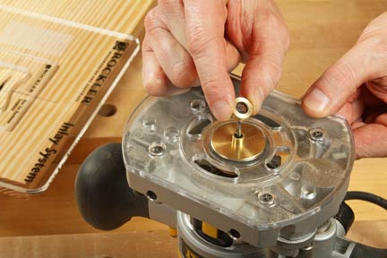 Installing bushing in plunge router base