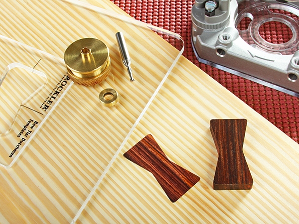 Butterfly key cutting tools and an installed key