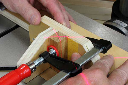Marking center point of blank with laser cross