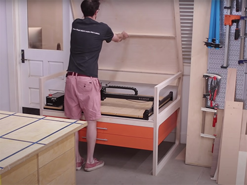 CNC worktable with lifting tabletop and drawers
