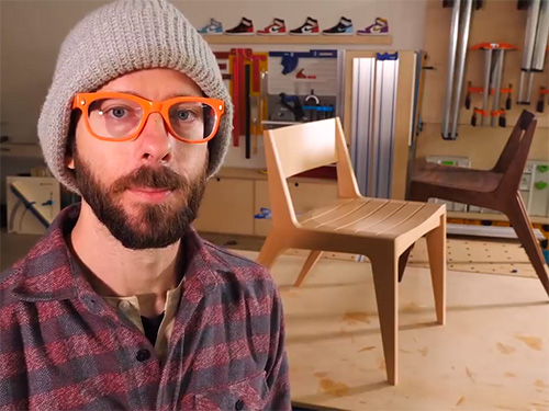 Chris Salomone with a pair of angular dining chairs