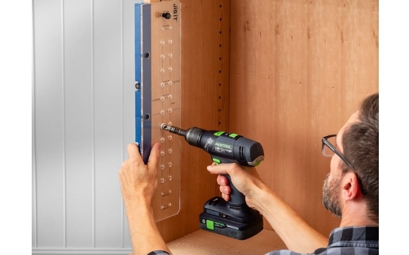 man using drill