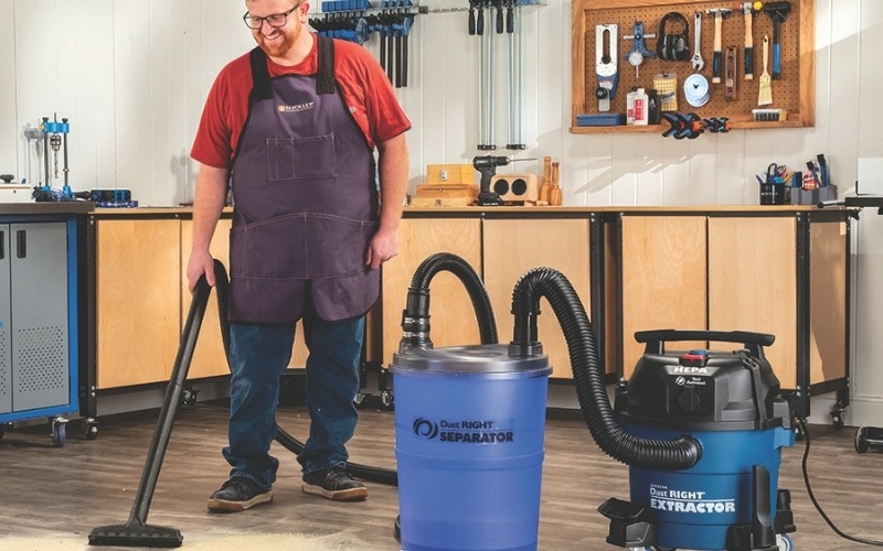 man using hepa dust vacuum