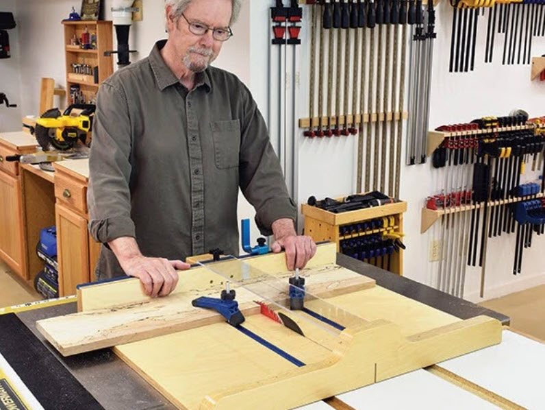man with diy crosscut sled