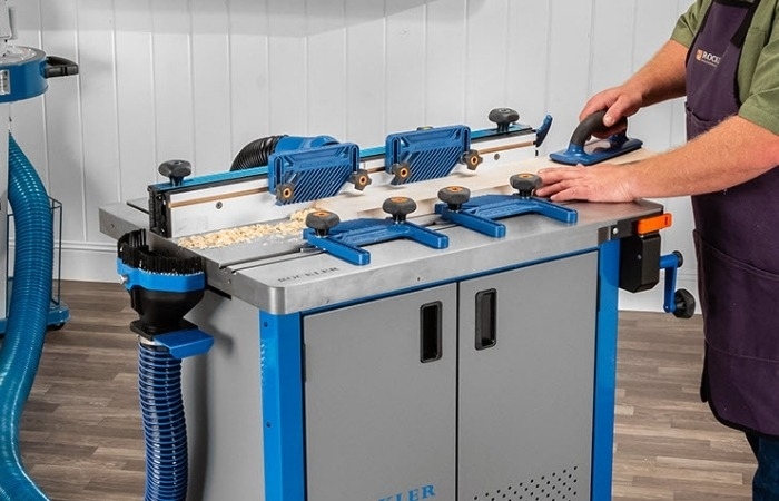 man working on router table