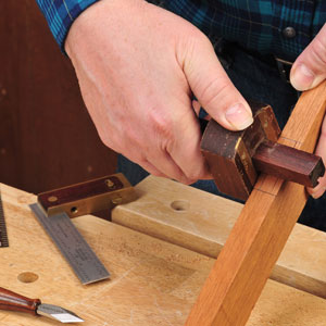 Using a marking gauge to set mortise cuts
