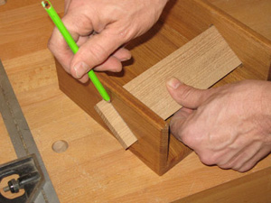 Marking waste to cut away from napkin holder rail