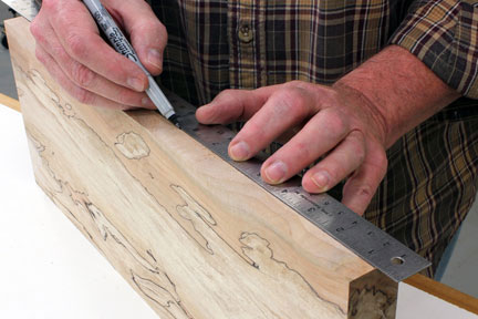 Measuring and marking the center point of a book-matched panel