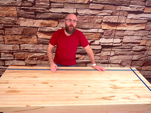 David Picciuto demonstrating a workbench with installed t-tracks