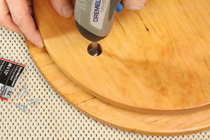 Attaching lazy susan top piece to mechanism and base
