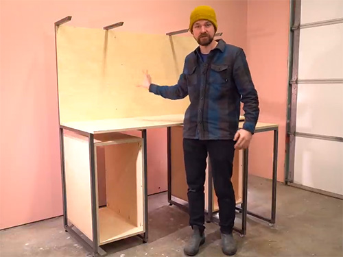 Michael Alm demonstrating his multipurpose workbench desk