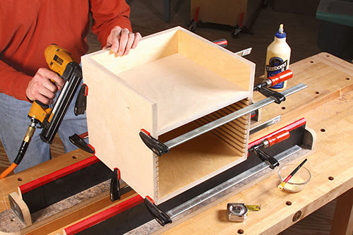 Using a nail gun and glue to assemble table saw blade organizer