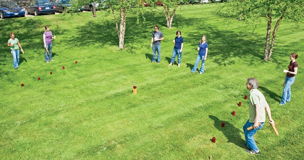 people playing kubb