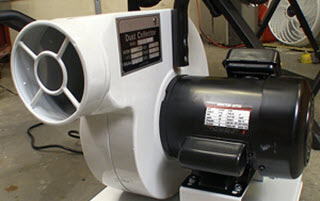 portable dust collector sitting on floor