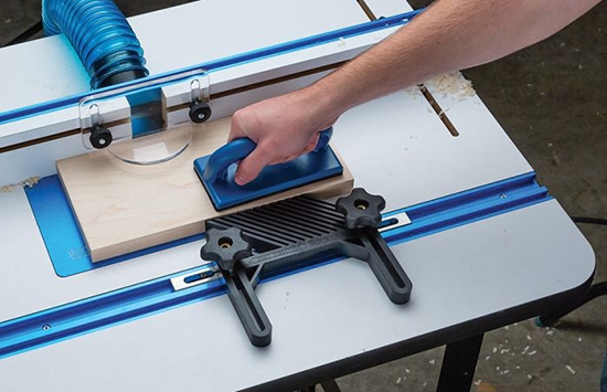 push block and featherboard on a router table