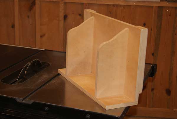 Completed raised panel table saw jig with holdable wings