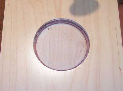 Cup holder routed using a small tip round-nose router bit