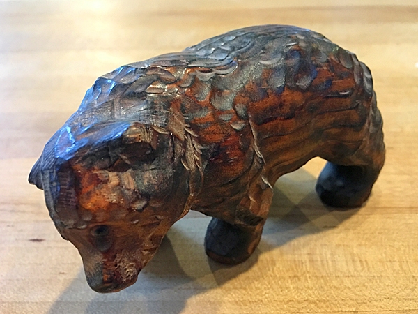 Small redwood carving of a bear with mineral oil finish