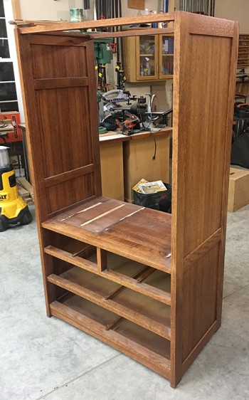 Pine cabinet set up to be refinished