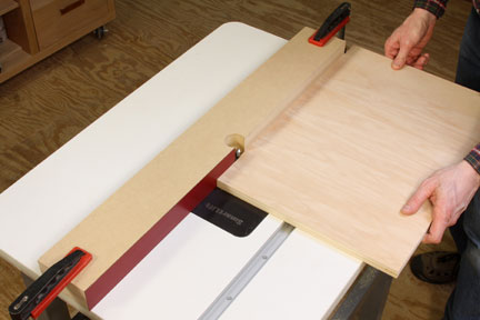 Making router cut on a test piece of plywood`