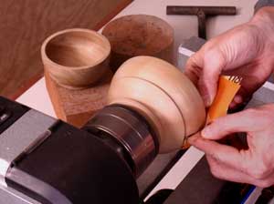 Using a lathe to aid in bowl sanding
