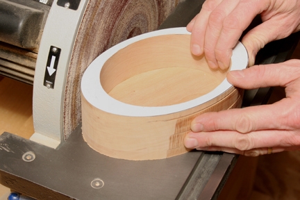 Using a disc sander to smooth the outside of keepsake box