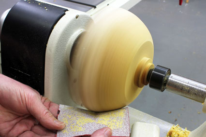 Sanding natural edge bowl blank base