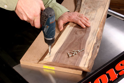 Screwing natural edged lumber into a carrier board