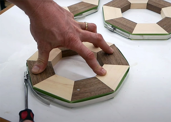 Glue up the segmented frames, using automotive hose clamps to hold the frames securely