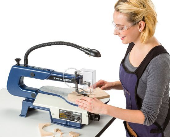 Women Using Scroll Saw