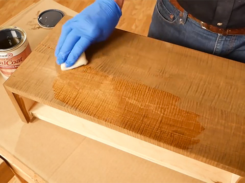 applying stain to hardwood