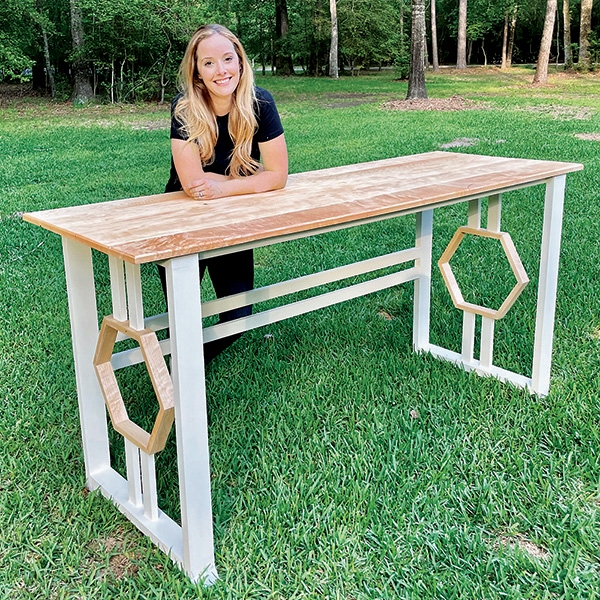 Sarah Listi next to standing desk